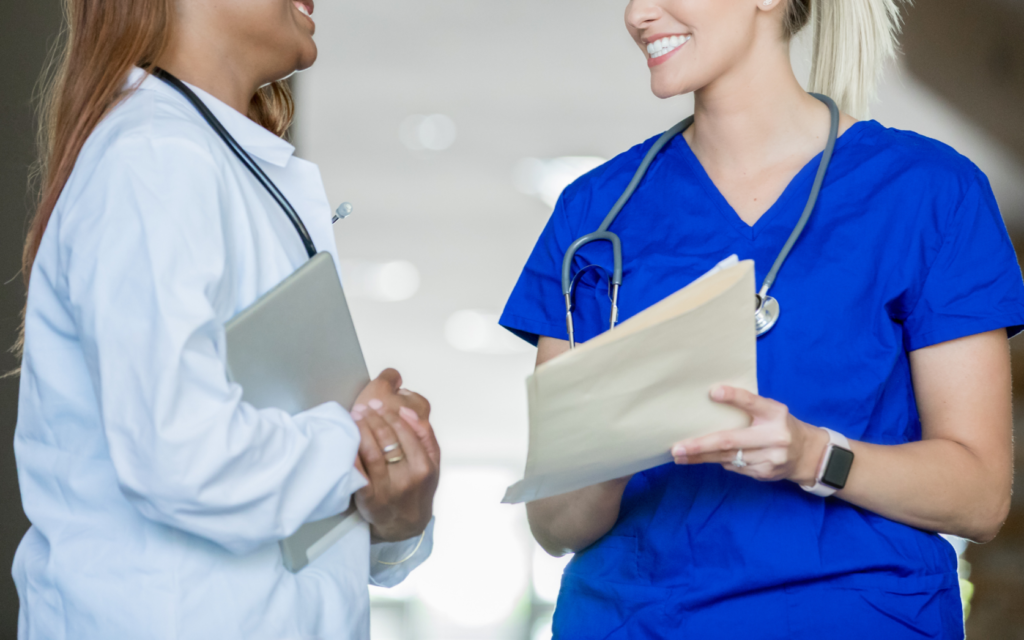a care team meets to discuss treatment plans for a patient